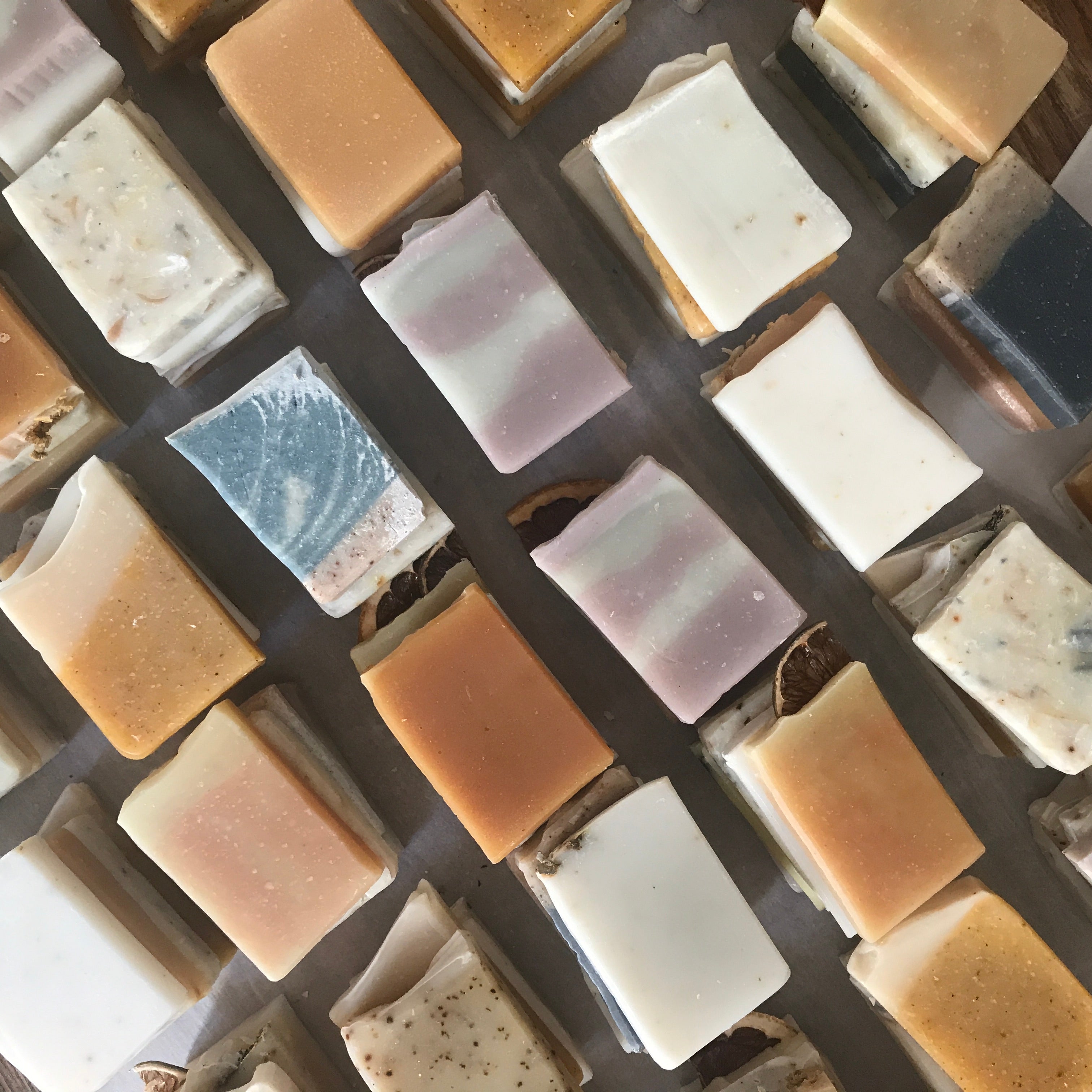 Hand Soap Sampler: A collection of four small, 100% natural artisanal hand soaps packaged in a reusable cotton bag. 